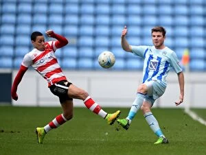 Images Dated 21st March 2015: Clash at Ricoh Arena: Chris Stokes vs Kyle Bennett, Sky Bet League One Showdown