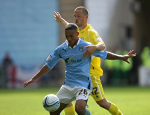 Images Dated 2010 September: Clash at Ricoh Arena: Coventry City vs. Leicester City - Jordan Clarke vs. Matt Fryatt