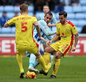 Clash at Ricoh Arena: Coventry City vs Milton Keynes Dons - Sky Bet League One: Intense Moment between Marcus Tudgay and Milton Keynes Dons Kyle McFadzean and Samir Carruthers