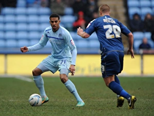 Images Dated 2013 January: Clash at Ricoh Arena: Cyrus Christie vs. David Mellor - Npower League One Showdown