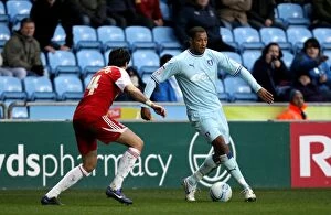 Images Dated 21st January 2012: Clash at Ricoh Arena: Platt vs. Williams - A Battle for Supremacy (Coventry City vs)