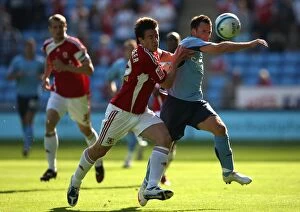 Images Dated 26th September 2009: Clash at the Ricoh: Coventry City vs. Middlesbrough - Championship Showdown - McIndoe vs. St. Ledger