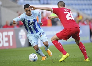 Images Dated 2014 October: Clash at the Ricoh: Jordan Clarke vs Mat Sadler - Sky Bet League One Showdown
