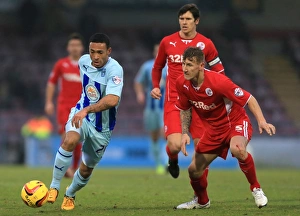 Images Dated 12th January 2014: Clash at Sixfields: Jordan Clarke vs