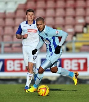 Images Dated 23rd November 2013: Clash at Sixfields: Leon Clarke vs Max Power - Sky Bet League One Rivalry