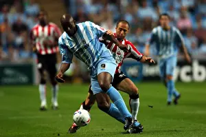 Images Dated 2005: Clash of Stars: Dele Adebola vs
