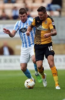 Images Dated 28th July 2015: Clash of the Titans: Chris Stokes vs Barry Corr in Coventry City's Pre-Season Battle at Abbey