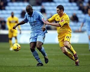 Images Dated 9th December 2006: Clash of the Titans: Dale Adebola vs. Chris McCann, Coventry City vs