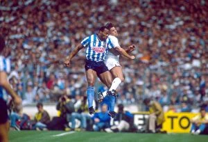 Images Dated 16th May 1987: Clash at Wembley: A Head-to-Head Battle - Cyrille Regis vs. Gary Mabbutt