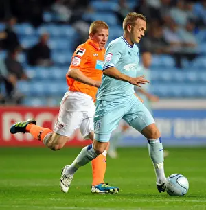 Images Dated 2011 September: Clingan vs. Southern: Battle for Supremacy in Coventry City vs