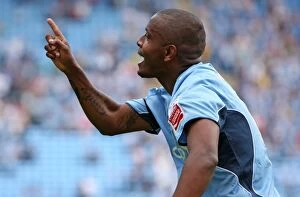 Images Dated 9th August 2009: Clinton Morrison Leads Coventry City in Championship Showdown Against Ipswich Town at Ricoh Arena