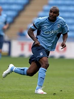 Images Dated 9th August 2009: Clinton Morrison Leads Coventry City Against Ipswich Town in Championship Match at Ricoh Arena