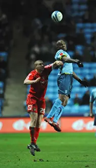 Images Dated 2010 January: Clinton Morrison vs. Carl Dickinson: Intense Battle in Coventry City vs