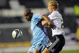 Images Dated 6th November 2009: Clinton Morrison vs. Dean Moxey: A Battle in the Championship - Coventry City vs