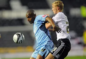 Images Dated 2009 November: Clinton Morrison vs. Dean Moxey: A Battle in the Championship - Coventry City vs