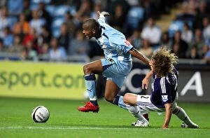 Images Dated 26th August 2008: Clinton Morrison vs Fabricio Coloccini: Coventry City vs Newcastle United in Carling Cup Second
