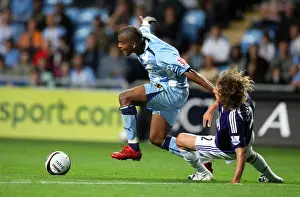 Images Dated 2008 August: Clinton Morrison vs Fabricio Coloccini: Coventry City vs Newcastle United in Carling Cup Second Round