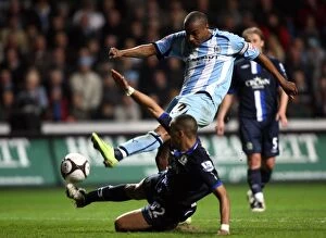 Images Dated 24th February 2009: Clinton Morrison's FA Cup Fifth Round Shot Blocked by Danny Simpson (Coventry City vs)