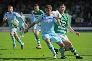 Coventry City V Yeovil Town: Huish Park: 18-08-2012 Prints: Cody McDonald's Determined Strike: Coventry City's Triumph over Yeovil's Richard Hinds (August 18)