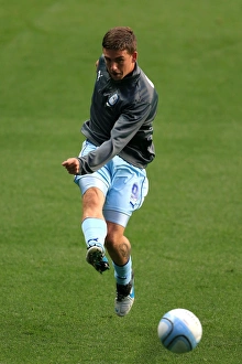 Johnstone's Paint Trophy : Northern Section : Coventry City V Burton Albion : Ricoh Arena : 04-09-2012 Prints: Cody McDonald's Intense Focus: Coventry City's Warm-Up Ahead of Burton Albion Clash at Ricoh Arena