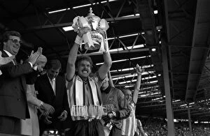 Legends Collection: Coventry City captain Brian Kilcline lifts the FA Cup after his teams 3-2 victory