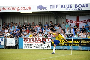 Images Dated 2012 July: Coventry City Fans Intently Watch Chris Hussey's Corner Kick at Nuneaton Town's Liberty Way Stadium