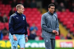 Images Dated 17th March 2012: Coventry City FC: Chris Hussey and Cyrus Christie Warming Up Ahead of Npower Championship Clash