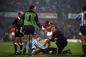 28th November 1990 - Rumbelows League Cup - Fourth Round - Coventry City v Nottingham Forest Collection: Coventry City FC: George Dalton Attends to Kevin Gallacher's Injury as Ogrizovic Offers Support
