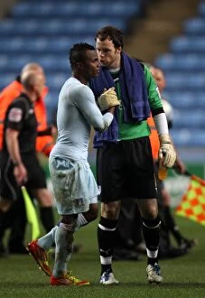 Images Dated 21st January 2012: Coventry City FC: Joe Murphy and Alex Nimely's Championship-Winning Moment (21-01-2012)