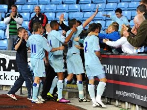 Images Dated 27th September 2011: Coventry City FC: Lukas Jutkiewicz Scores Second Goal, Celebrates with Fans and Team