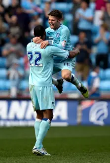 Images Dated 2012 March: Coventry City FC: Oliver Norwood and Clive Platt's Championship-Winning Moment with Portsmouth (24-03-2012)