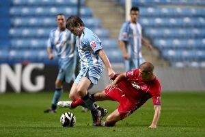 Images Dated 13th August 2008: Coventry City vs Aldershot Town: A Battle for the Ball in the Carling Cup (August 13, 2008)