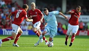 01-10-2011 v Barnsley, Oakwell Stadium Collection: Coventry City vs Barnsley: Lucas Jutkiewicz Faces Off Against Stephen Foster