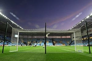 Images Dated 27th September 2011: Coventry City vs. Blackpool: Championship Match at Ricoh Arena - Sunset Over the Stadium