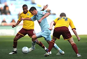 Images Dated 22nd October 2011: Coventry City vs Burnley: Lukas Jutkiewicz Fights for Possession in Npower Championship Match