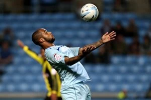 Images Dated 4th September 2012: Coventry City vs Burton Albion: David McGoldrick's Thrilling Performance in the Johnstones Paint