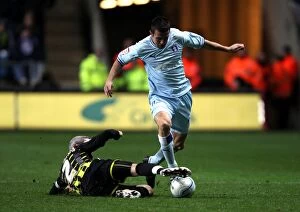 Images Dated 22nd November 2011: Coventry City vs. Cardiff City: Wood vs. McNaughton - Intense Tackle in Npower Championship Clash