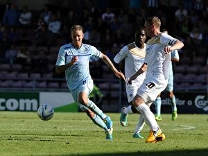 Images Dated 8th September 2013: Coventry City vs Colchester United: A Football Rivalry - Carl Baker vs Brian Wilson