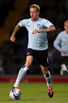 Images Dated 2011 September: Coventry City vs Derby County: Championship Clash at Ricoh Arena - Carl Baker in Action Against Ipswich Town