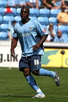 Images Dated 9th August 2009: Coventry City vs Ipswich Town: Isaac Osbourne in Action - Championship Match at Ricoh Arena