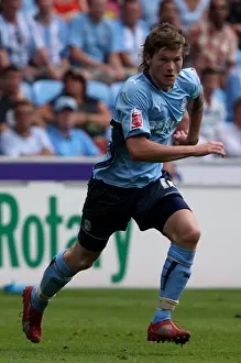 Images Dated 2009 August: Coventry City vs Ipswich Town Showdown: Aron Gunnarsson's Battle at Ricoh Arena (09-08-2009)