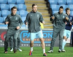 Images Dated 14th February 2012: Coventry City vs Leeds United: Richard Keogh and Team Warm-Up at Ricoh Arena (Npower Championship)