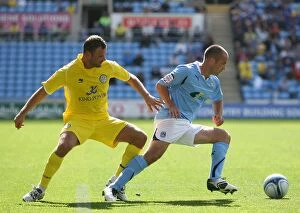 Images Dated 11th September 2010: Coventry City vs. Leicester City: Clash at the Ricoh Arena - Michael Doyle vs