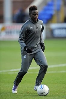 Images Dated 17th December 2011: Coventry City vs. Peterborough United: Championship Battle - Gael Bigirimana in Action