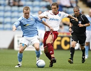 Images Dated 7th August 2010: Coventry City vs Portsmouth: A Championship Showdown at Ricoh Arena (2010)