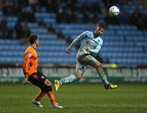 Images Dated 2012 November: Coventry City vs Portsmouth: James Bailey vs Darel Russell - Npower League One Rivalry at Ricoh Arena