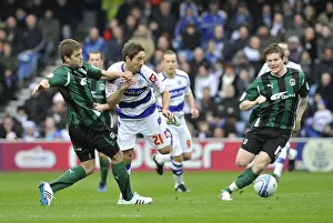 Images Dated 2011 January: Coventry City vs. Queens Park Rangers: Intense Battle for the Ball - Npower Championship (23-01-2011)