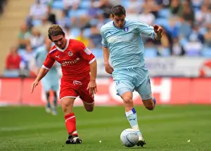Coventry City vs. Reading: Clash between Lukas Jutkiewicz and Jay Tabb in the Npower Championship at Ricoh Arena
