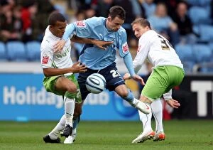Images Dated 31st October 2009: Coventry City vs Reading: Intense Battle for the Ball - McIndoe vs Bertrand and Howard