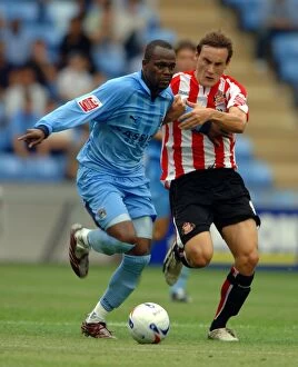 Images Dated 6th August 2006: Coventry City vs Sunderland: A Championship Battle - Ricoh Arena (Stern John vs Dean Whitehead)